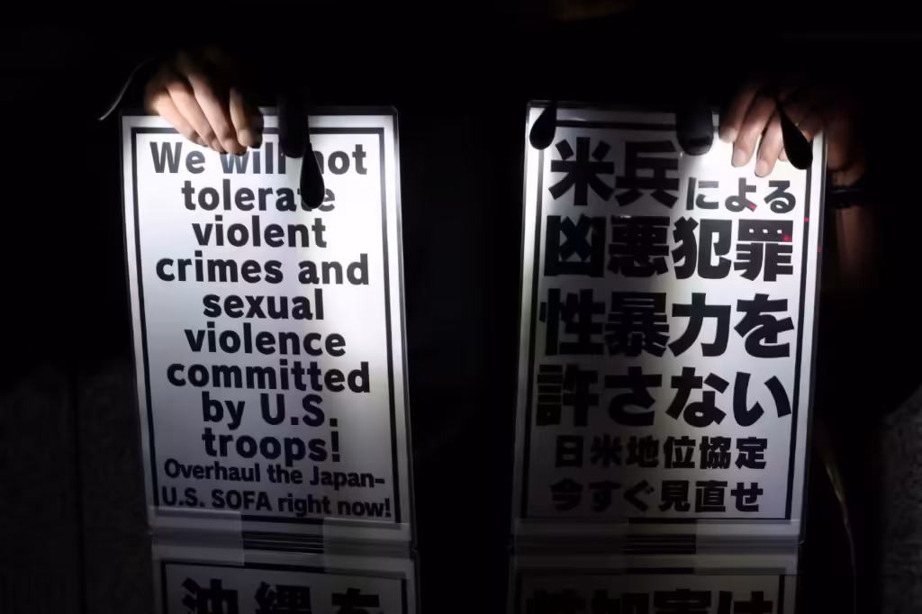 A U.S. Marine has been arrested in the killing of a woman on Okinawa, triggering outrage in Japan