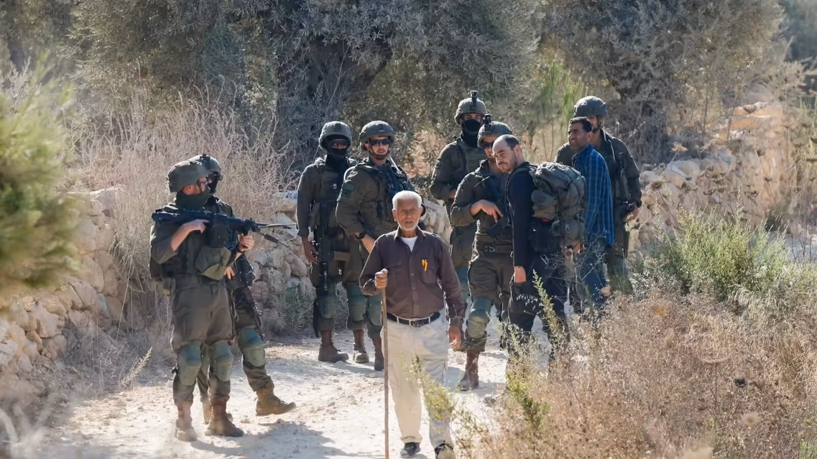 Israeli settlers attack Palestinian farmers during olive harvest | Occupied West Bank