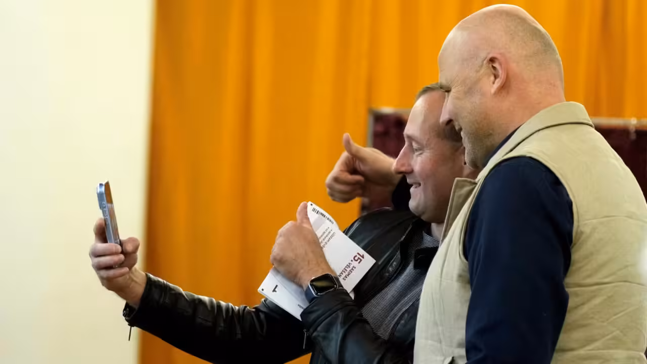 Latvia exit polls put PM's pro-Ukraine party ahead but coalition partners stumble