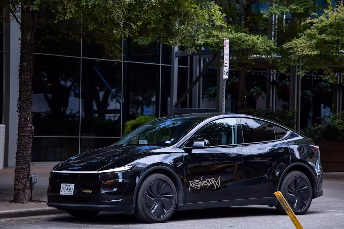Tesla stock rises as company reports Q3 deliveries that top analyst estimates