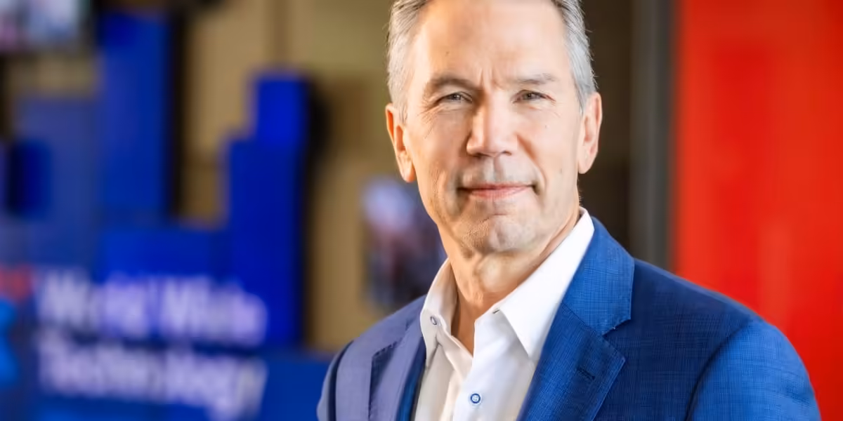 This billionaire CEO went from counting cars in the parking lot past 6pm to embracing hybrid work